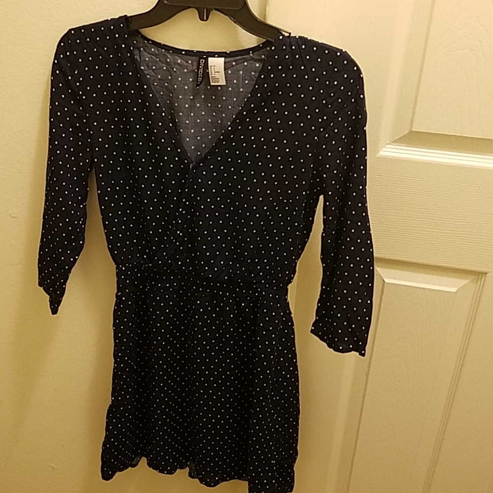 Long sleeve navy blue dress with white polka dots